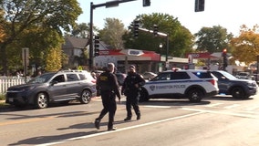 RAW: Crowds gather in Evanston during ICE operation; damaged car towed from scene