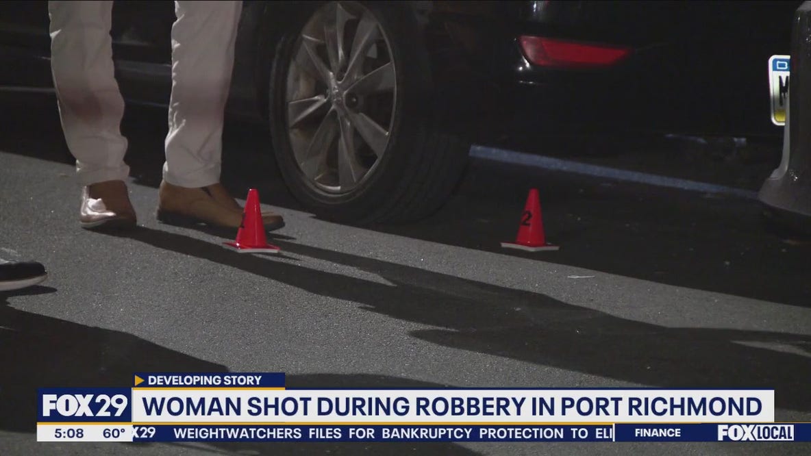 Woman shot as couple robbed of $1,000 in Port Richmond: police