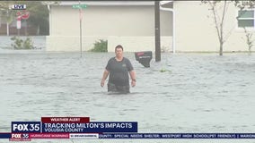 Volusia Co. resident wades through water to escape home