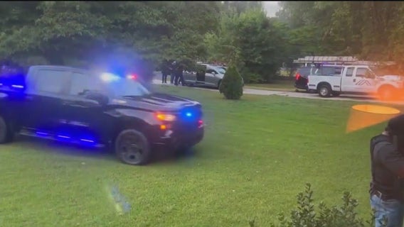 Four arrested in SWAT standoff in Austell following gunfire during drug raid