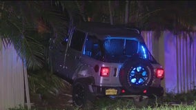 Jeep crashes into fence in Orange County