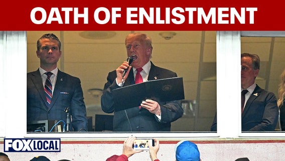 President Trump gives oath of enlistment at Commanders game