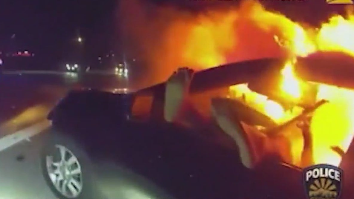 Goodyear PD officer pulls woman from burning car on I-10