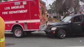 Car slams into LAFD fire truck