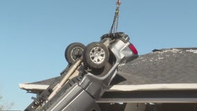 Cleaning up the destruction in Alvin after Saturday's tornado