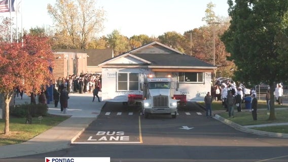 Oakland Technical Center students' newly-built house moved to Pontiac lot