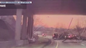 Stacks of wood flies into oncoming traffic