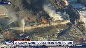 Multi-alarm fire engulfs warehouse in Kensington