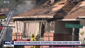 Oakland: Woman's husband makes it out of fire alive, home's windows blown out