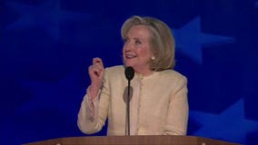 Hillary Clinton smiles to 'Lock him up' chants