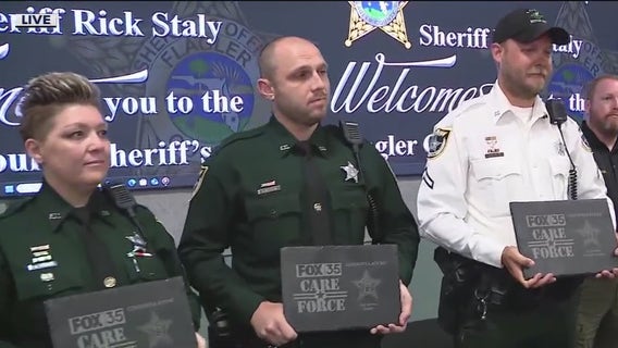 4 Flagler County deputies help to save a man threatening to jump off of overpass