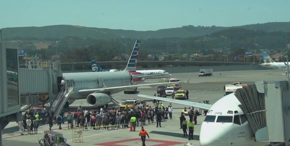 Laptop in checked luggage caused smoke, evacuation of plane at SFO