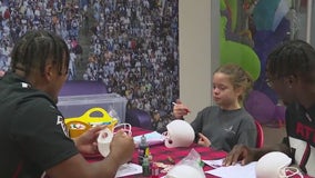 Falcons bring Halloween joy to kids at Children’s Healthcare