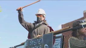 Protesters breach fence outside Democratic National Convention