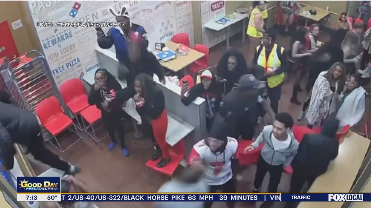 NJ officer hit in head with chair during wild brawl at Domino's pizza