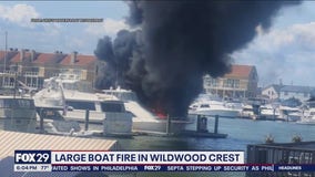 Boat fire spews huge flames, smoke, injures 4 people