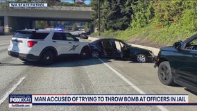 Police chase, improvised explosive caused I-90 shutdown: docs