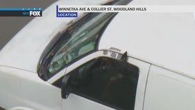 LAPD in pursuit of armed suspect in San Fernando Valley