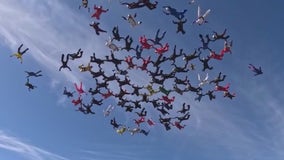 Team of 68 female skydivers attempt record jump