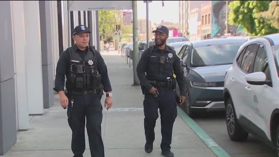 2 Oakland police officers credited with helping save the life of robbery victim