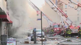 Large fire in the Bronx engulfs row of stores