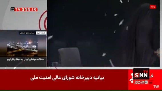 Watch: Iranian state TV anchor ducks for cover amid Israeli airstrike