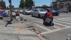 Oakland cleans up sidewalk trash after women in wheelchairs forced to ride in street