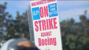 Boeing raises offer to end strike