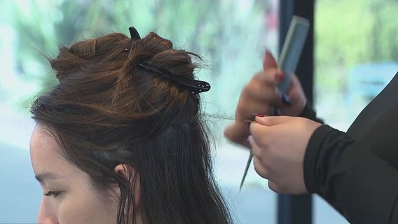 Arizona hair salon hosts cut-a-thon for fire victims