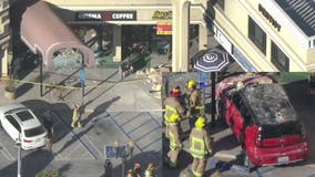 Car smashes into coffee shop in Los Angeles