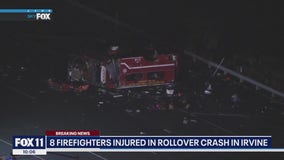 At least 8 hurt after fire truck flips over