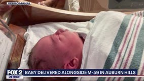 Oh baby: Newborn delivered in ambulance alongside M-59