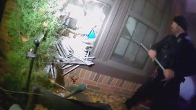 Intense body cam footage shows moment police save elderly couple from house fire