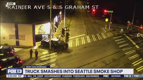 Truck smashes into Seattle smoke shop