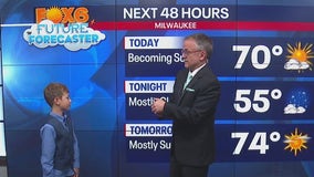 Elliot helps Rob Haswell with the weather