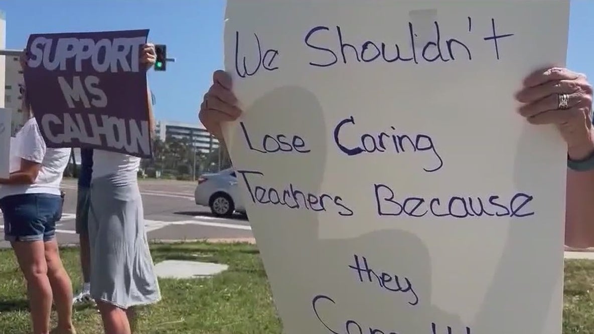 Students protect teacher's removal