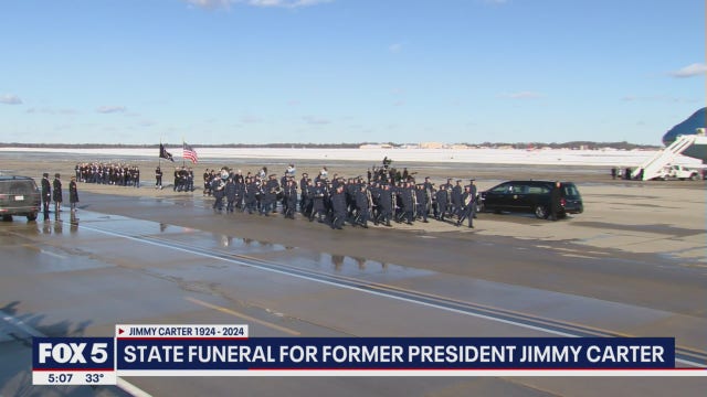 President Jimmy Carter arrives in DC for official state funeral