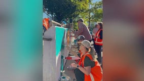 Keep America Beautiful volunteers paint murals in Atlanta