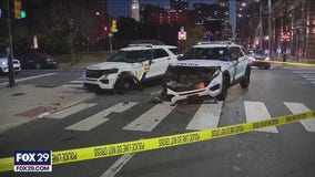 2 police cars crash while chasing reported stolen car