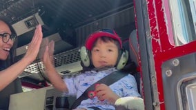 3-year-old celebrates last cancer treatment in firetruck ride