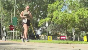 Woman running marathons for sexual assault awareness