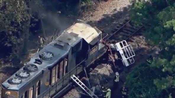 Two ejected from vehicle after being hit by a train