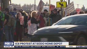 Immigrant advocates rally at SODO Home Depot, protest ICE enforcement raids