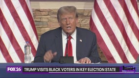 Former President Donald Trump visits Black church in key election state