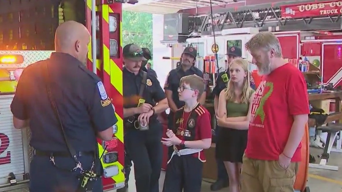 Boy meets firefighters who saved him from crash