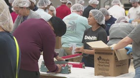 Forgotten Harvest volunteers pack food for those in need on 9/11