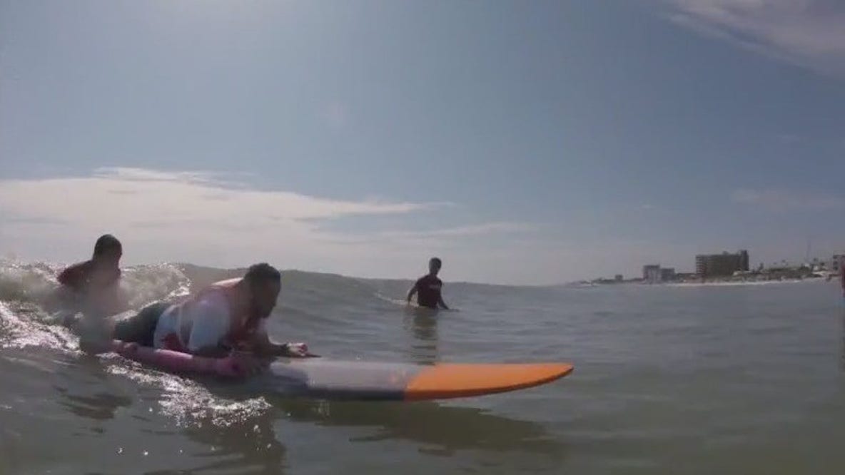 Wounded Warriors go surfing at New Smyrna Beach