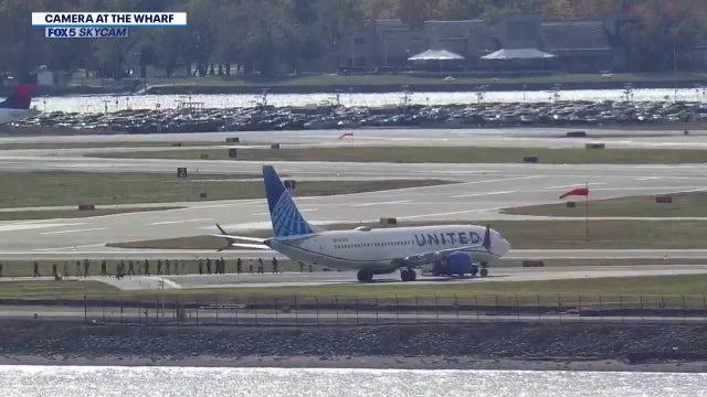 Arriving flight evacuated at Reagan National Airport after reports of a bomb threat