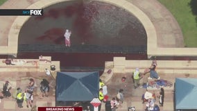 Protesters add red dye to UCLA fountain