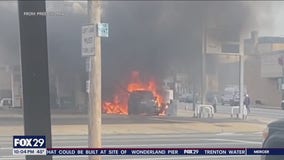 Car hits gas pump, bursts into flames